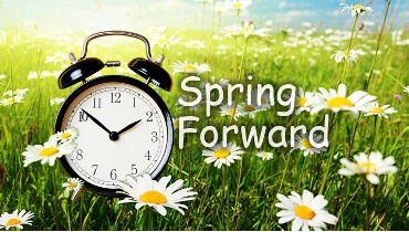 Spring Forward, with a clock in the distance.