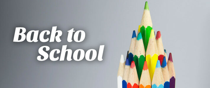 Back to School with colored pencils in the background. 