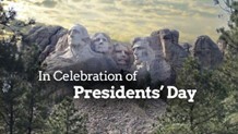 In celebration of Presidents Day text in front of Mount Rushmore.