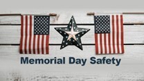 Memorial Day Safety. Two small American flags on each side of a star.